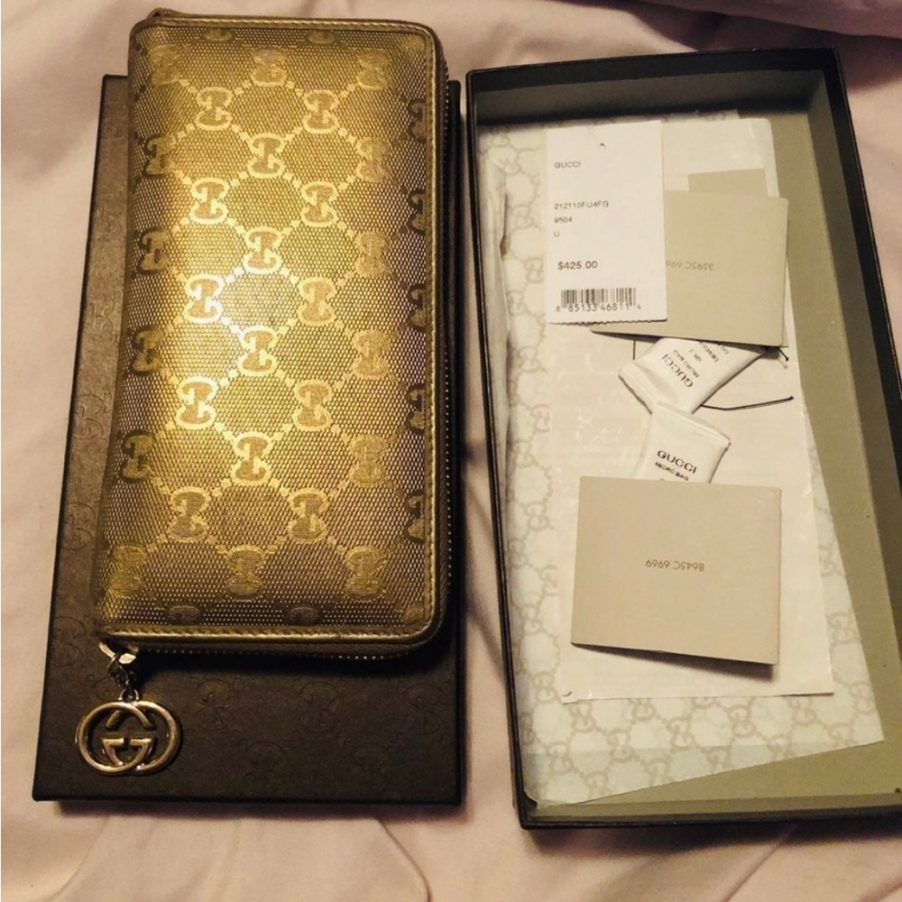 Gucci monogram zipper wallet
